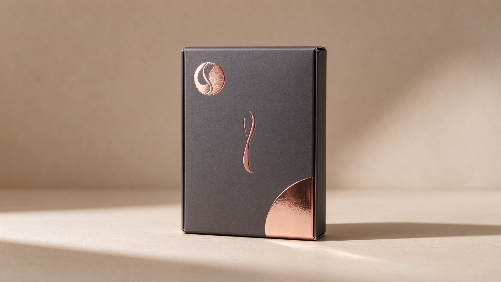 Illustrative cosmetic carton showing a foil-stamped logo, a blind-embossed wordmark, and a spot-UV accent as separate finish moments