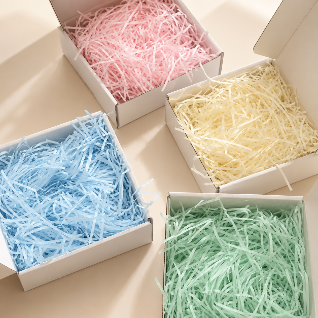 Shredded paper fillers for premium gift box packaging